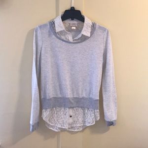 Gray and cream sweater.